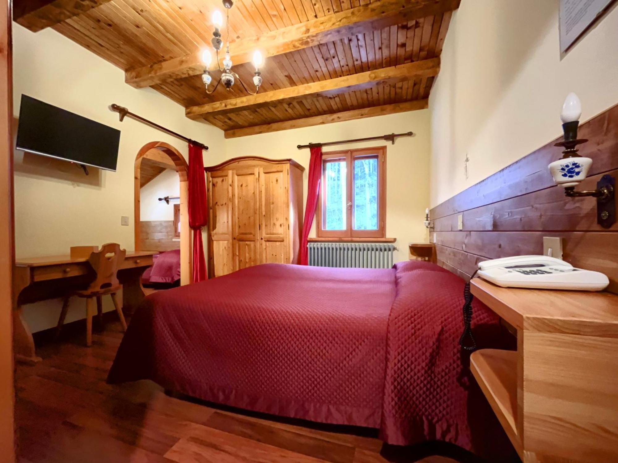 Hotel Garni Mille Pini Скано Екстериор снимка