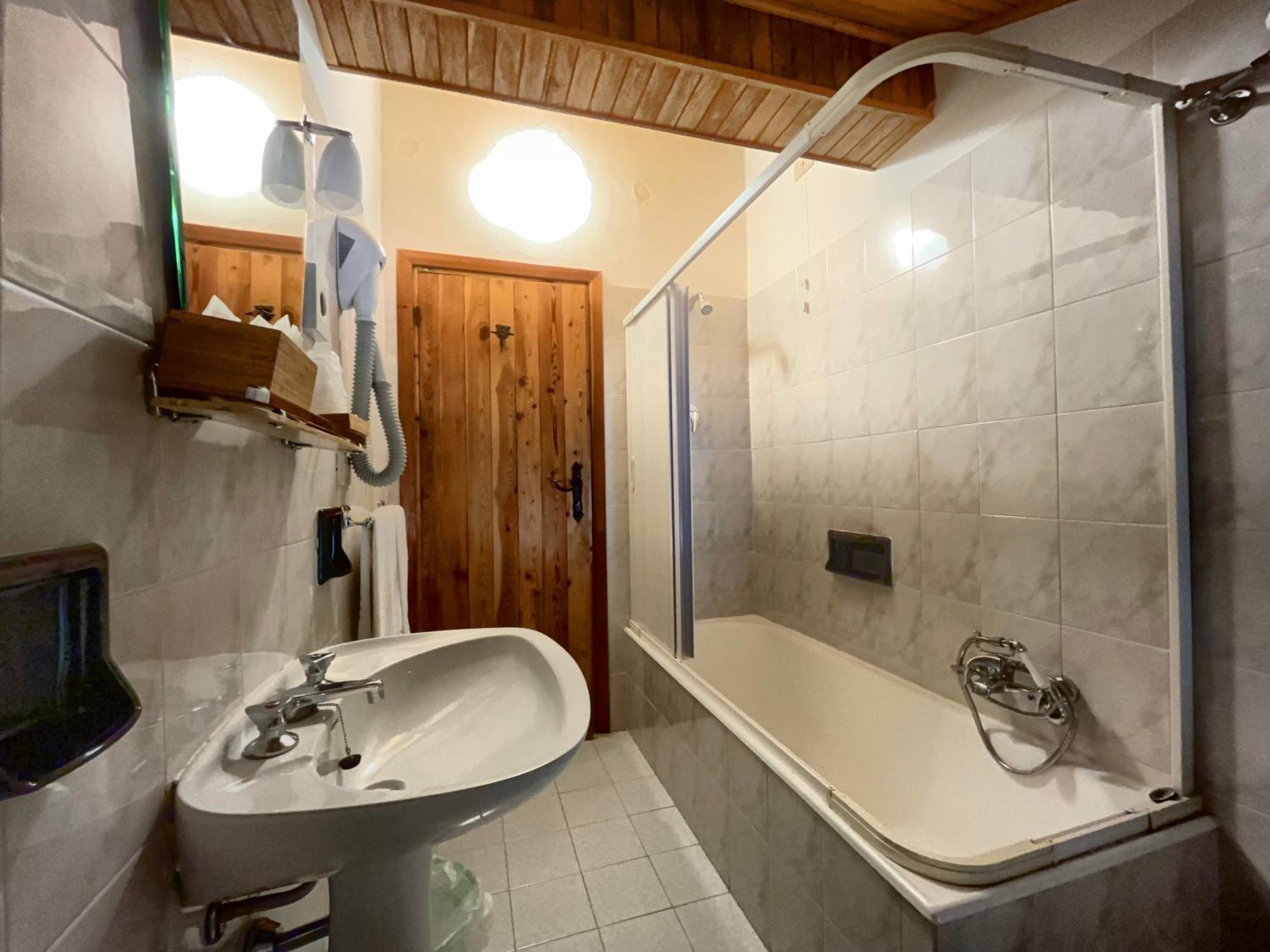 Hotel Garni Mille Pini Скано Екстериор снимка